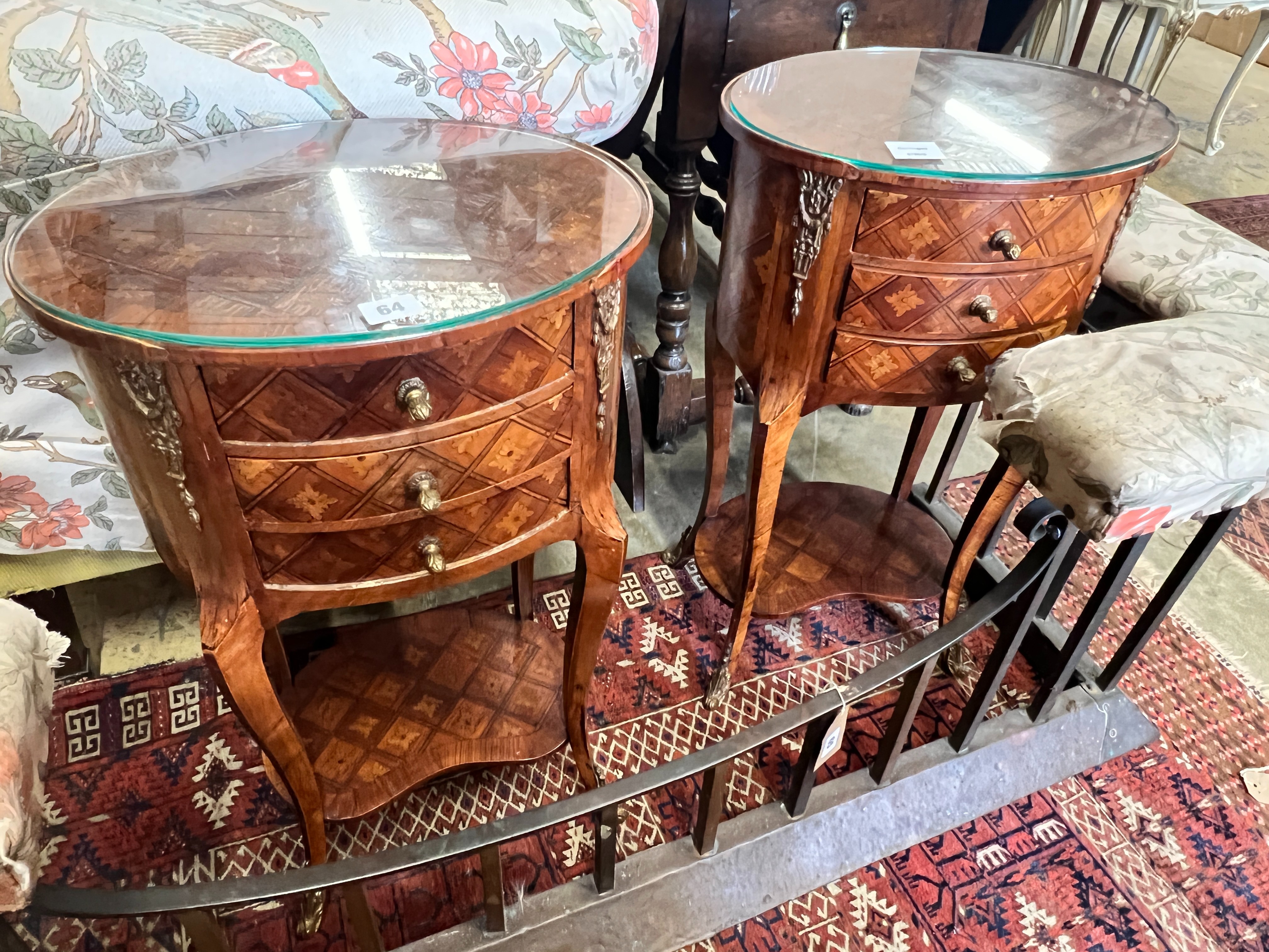A pair of French transitional style oval parquetry inlaid bedside cupboards, kidney shaped under tiers, width 40cm, depth 30cm, height 69cm